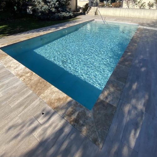 realisation de piscine beton carrelage gris à Thonex